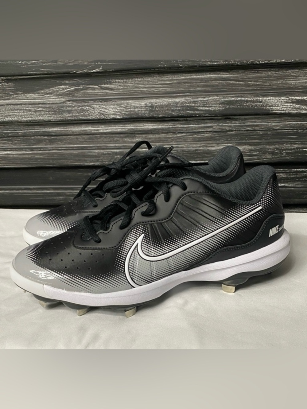 Nike Alpha Huarache Black and White Gradient Baseball Cleats.